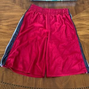 Red boys basketball shorts. Size medium.